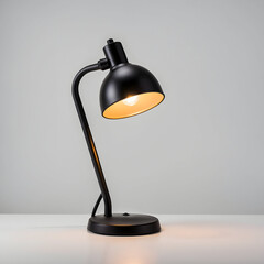 Sleek Black Desk Lamp Illuminating White Surface