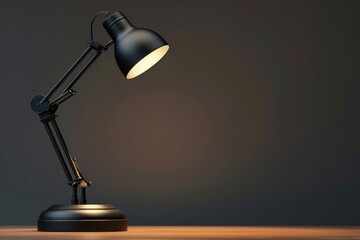 A black desk lamp illuminating a wooden surface against a dark background in a minimalist setting