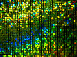 Wind Driven Shimmer Wall, Square metal reflectors shining
