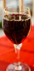 glass of red wine on a table