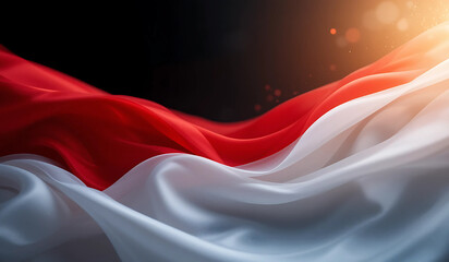 Close-up of a flowing Indonesian flag, red and white, with a dramatic lighting effect. Perfect for patriotic, national, or celebratory designs.