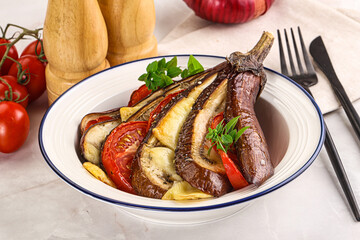 Baked tomato with mozzarella and tomato