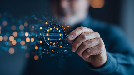 Man analyzing digital compliance icon with EU stars on screen using magnifying glass. 66385708 1