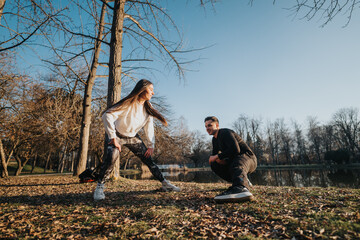Two individuals engage in outdoor exercises, fostering connection amidst nature's beauty during a...