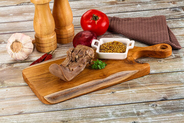 Steamed pork tongue with mustard