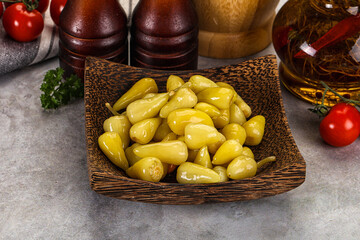 Turkish traditional marinated mini chili peppers
