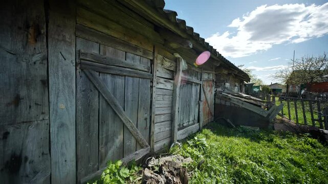 Old wooden barn falling apart in slavic village