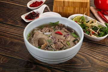 Vietnamese Pho Bo soup with beef and noodles