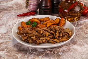 Baked shredded pork with potato