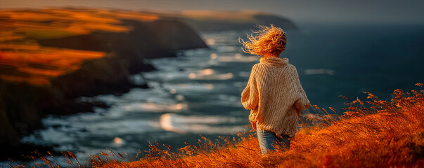 Woman seated in thick sweater from behind contemplating sea and cliffs from cliffside at sunset Generated with AI