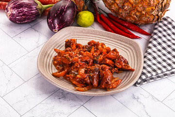 Asian cuisine - pork in chili sauce