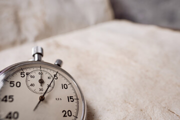 Mechanical stopwatch copy space, Clock time stop watch ticking on a 5 seconds. Half of Clock dial...