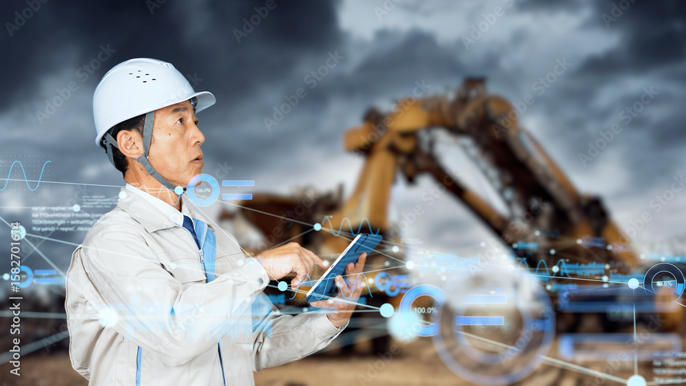 Poster engineers using tablets and digital data at a construction site