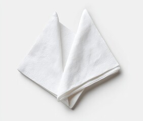 Two crisp, white linen napkins folded into neat triangles, displayed against a plain white background