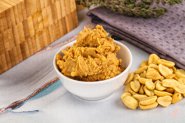 Crunchy peanut butter fat product