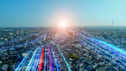 都市風景と未来へと伸びる光の帯