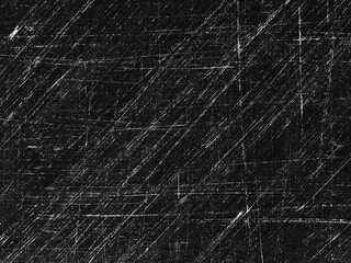 Surface with scratches and marks shows intricate patterns created over time