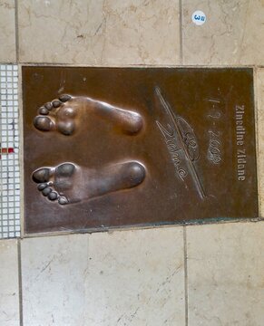 Monaco, July 31, 2017. A bronze plaque featuring the footprints and signature of legendary footballer Zinedine Zidane, dated January 9, 2009
