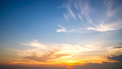 Sunset sky background in the evening with gradient natural light and dramatic cloud, long exposure