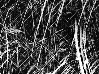 Abstract black and white texture featuring streaks and scratches on a surface