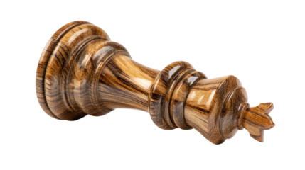 Wooden king chess piece lies on its side with a transparent background.