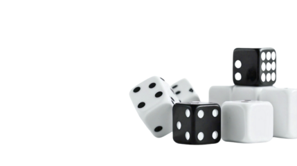 Black and White Dice Cubes Falling on White Surface
