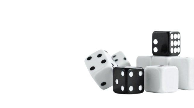 Black and White Dice Cubes Falling on White Surface
