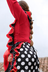 Spanish woman dancing flamenco
