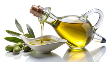 Olive oil being poured from a glass bottle into a small white dish with olives isolated on transparent background