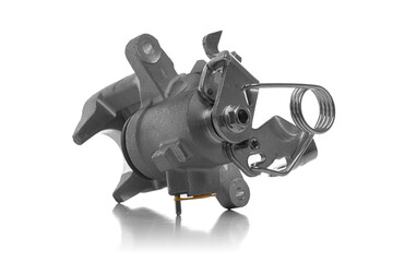 New unpainted car brake caliper against a white background.