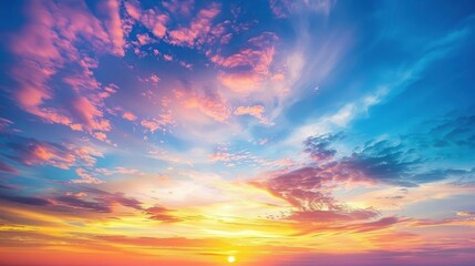 Obraz premium Sunset sky filled with streaky, colorful clouds stock photo --ar 16:9 --raw --v 6 Job ID: 234f863a-663a-46a3-89f0-61c6002b0f11