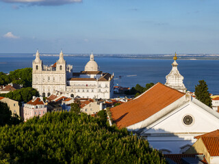 Scenic view of São Vicente de Fora Monastery and National Pantheon in Lisbon with red rooftops and...