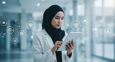young business woman looking at modern tablet