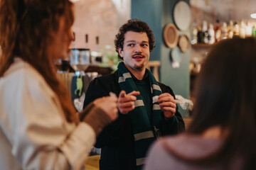 Three people engaging in discussion in a welcoming cafe environment, fostering connection and...