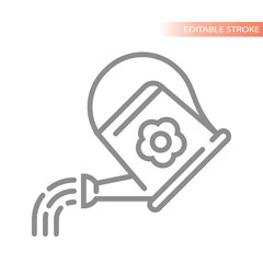 Watering can pouring water with flower. Watering and irrigation by hand home gardening tool.