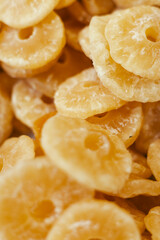 Dried fruit on sale at outdoor farmer market. The fruit shrinks during this process, leaving a...