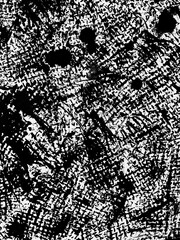 Abstract black and white texture showcasing dynamic patterns and splatter effects on a textured...