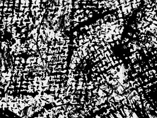Abstract black and white pattern created by ink splashes and brush strokes on paper in an artistic...