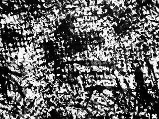 Abstract black and white texture showcasing chaotic brush strokes and patterns created without...