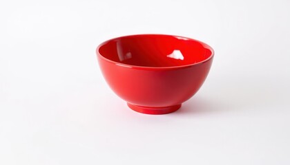 Red ceramic bowl isolated on white background, studio shot
