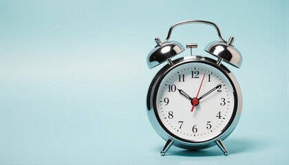 Vintage Alarm Clock on Pastel Blue Background - Minimalist Time Management Concept for Productivity Apps, Corporate Presentations, and Business Efficiency Training