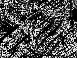 Abstract black and white texture featuring dynamic brush strokes and patterns creating a...