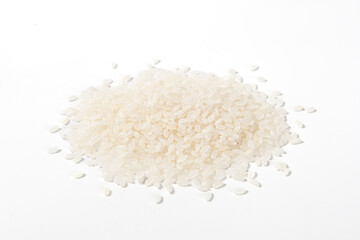 Organic raw rice isolated on white background.
