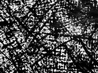 Abstract black and white texture with intricate lines and patterns created by contrasting shapes and shadows