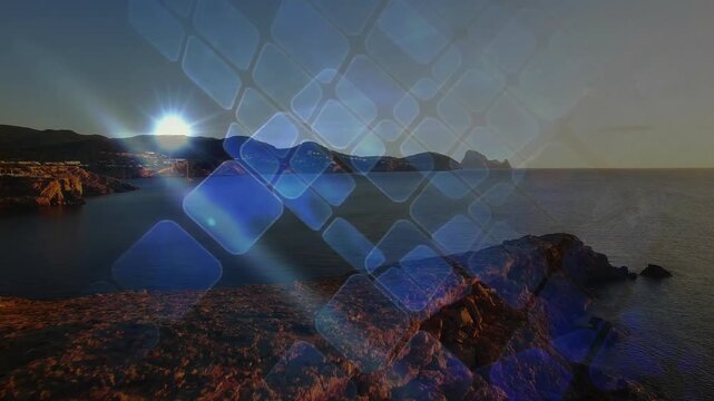 Sun glare flashing near shore causing diamond grid pulsing, drifting, fading to reveal rocky coast
