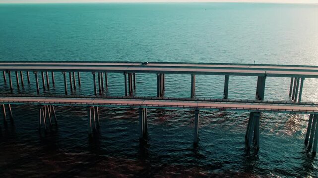 Sunset Aerial of Lake Pontchartrain Causeway, Louisiana &ndash; Scenic Twin-Span Bridge Crossing