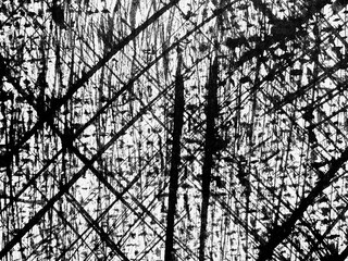 Abstract monochrome artwork showcasing intricate lines and textures in a dynamic pattern