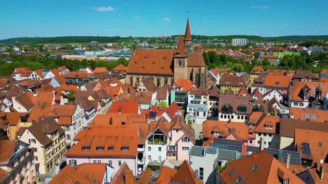 4K Aerial Drone Video of the Historic St. Johannis Church in the Old Town area of Downtown Ansbach, Germany