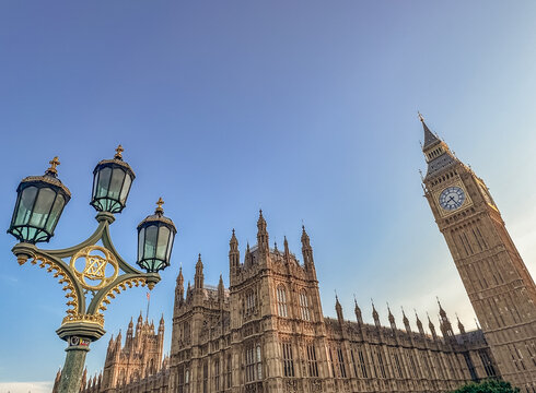 Houses of Parliament with Big Ben and lamppost in London. England.
