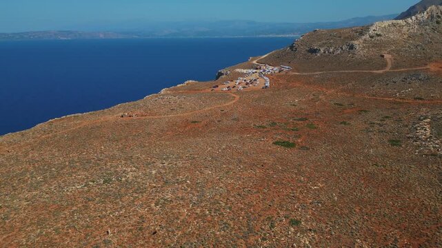 A Parking Lot In Isolated Landscape In Balos Beach Coast In Kissamos, Greece. Aerial Drone Shot